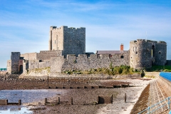 Medieval Norman Castle in Carrickfergus near Belfast, Northern Ireland, during a low tide